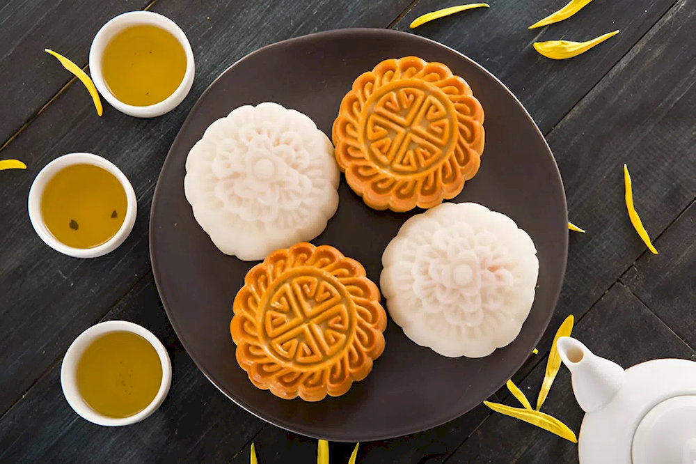 The beautifully designed white sticky and golden baked mooncakes are essential during the Mid-Autumn Festival